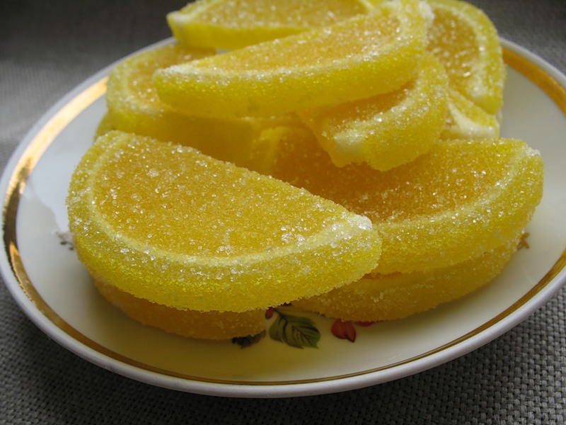 Что можно приготовить из желтых. Цукаты Лимонов. Засахаренные лимонные дольки. Лимонные мармеладки. Мармелад дольки лимона.